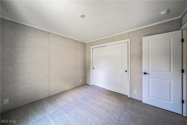 8323 Eagle Rd Unit 42, Kirtland, OH 44094 - unfurnished bedroom with carpet floors, a closet, and ornamental molding