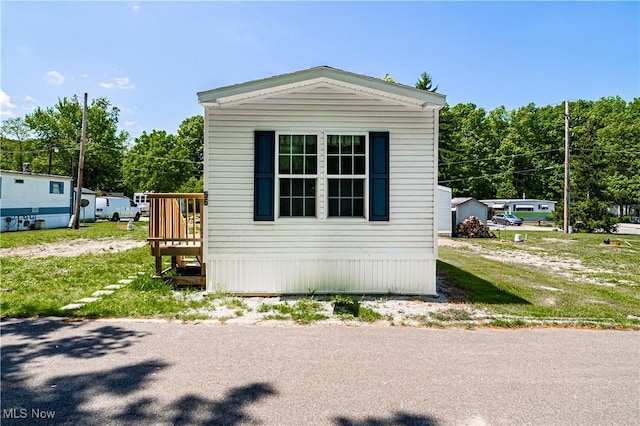 8323 Eagle Rd Unit 42, Kirtland, OH 44094 - view of home's exterior featuring a wooden deck