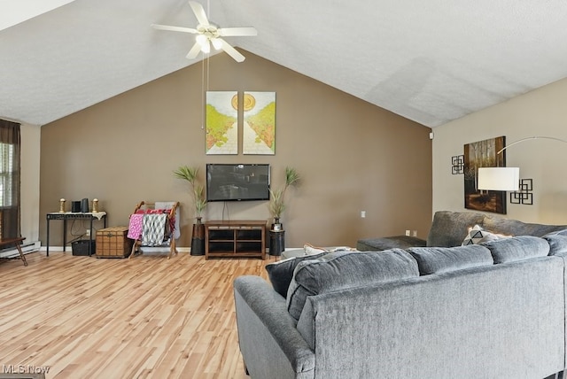91 Falling Water Cir, Munroe Falls, OH 44262 - living area featuring wood finished floors, ceiling fan, and lofted ceiling