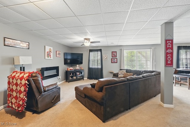 91 Falling Water Cir, Munroe Falls, OH 44262 - living area featuring light carpet, a paneled ceiling, and a ceiling fan