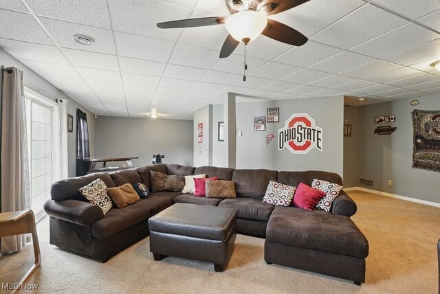 91 Falling Water Cir, Munroe Falls, OH 44262 - living room featuring carpet floors, a paneled ceiling, and a ceiling fan