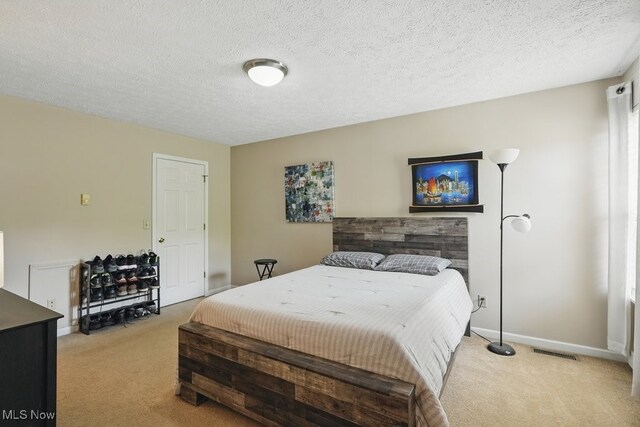 91 Falling Water Cir, Munroe Falls, OH 44262 - bedroom featuring carpet floors and a textured ceiling