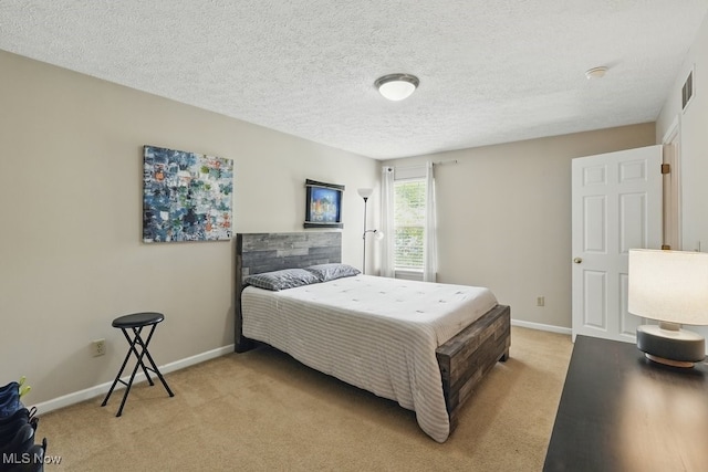 91 Falling Water Cir, Munroe Falls, OH 44262 - bedroom featuring light colored carpet and a textured ceiling