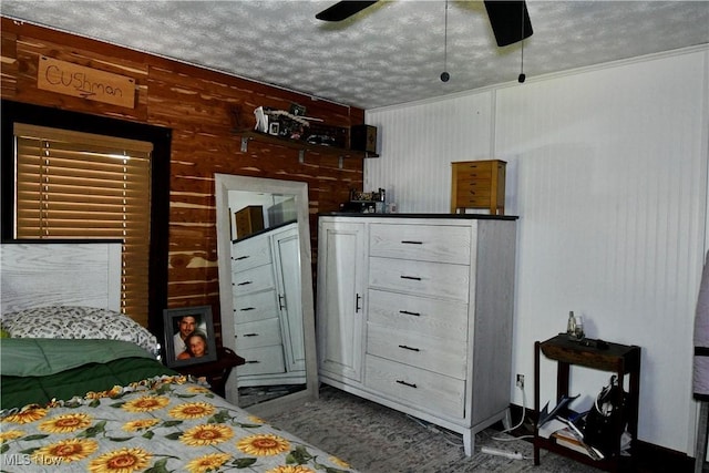 5041 W S Range Rd, Salem, OH 44460 - bedroom featuring a textured ceiling, carpet floors, and wood walls