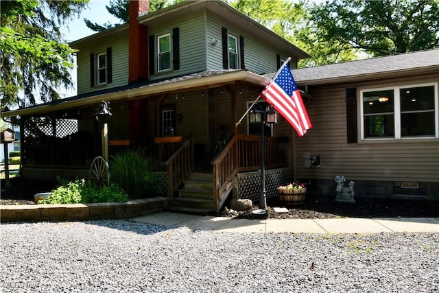 5041 W S Range Rd, Salem, OH 44460 - view of front facade featuring a chimney and covered porch