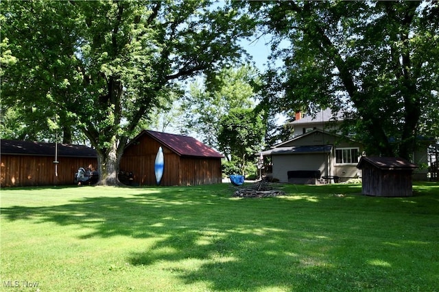 5041 W S Range Rd, Salem, OH 44460 - view of green lawn featuring a storage unit