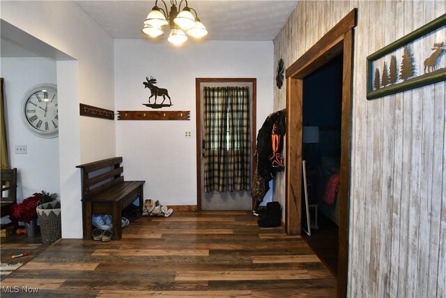 5041 W S Range Rd, Salem, OH 44460 - hallway featuring wood finished floors and a chandelier