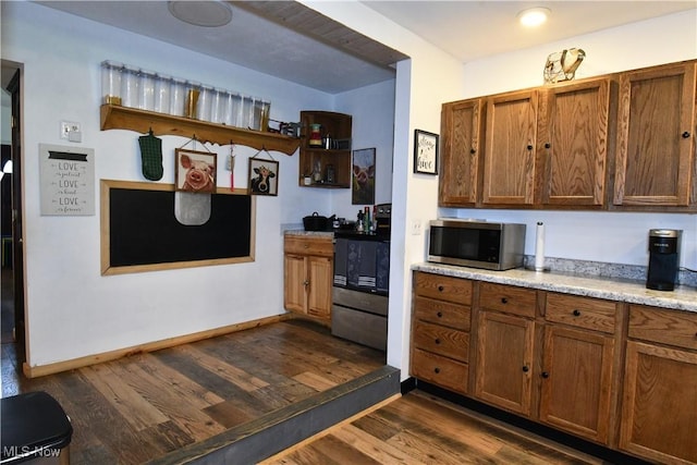 5041 W S Range Rd, Salem, OH 44460 - kitchen with appliances with stainless steel finishes, dark wood-type flooring, and brown cabinets