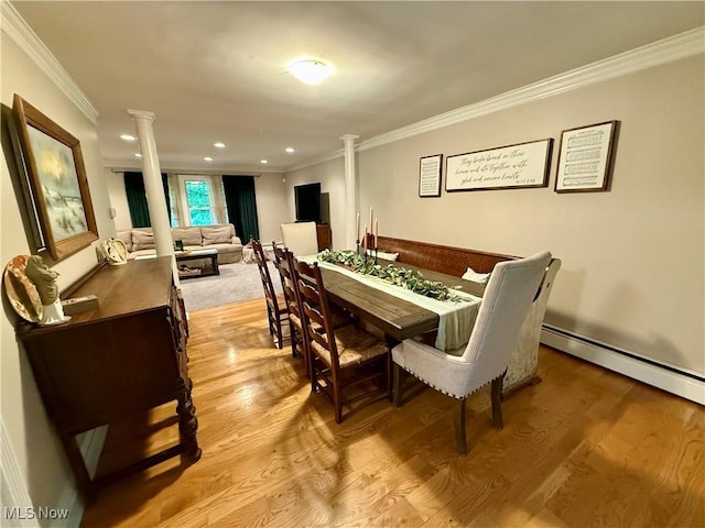 15217 Fox Run, Chagrin Falls, OH 44022 - dining space with ornate columns, crown molding, light wood-type flooring, recessed lighting, and a baseboard heating unit