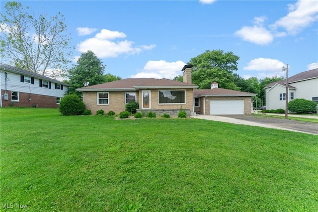 6567 Mount Everett Rd, Hubbard, OH 44425 - ranch-style home featuring a chimney, a garage, a front yard, and driveway