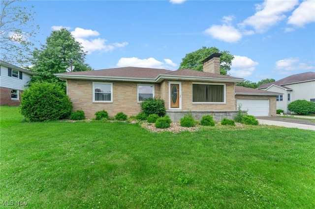 6567 Mount Everett Rd, Hubbard, OH 44425 - ranch-style house with a chimney, a garage, a front lawn, brick siding, and driveway