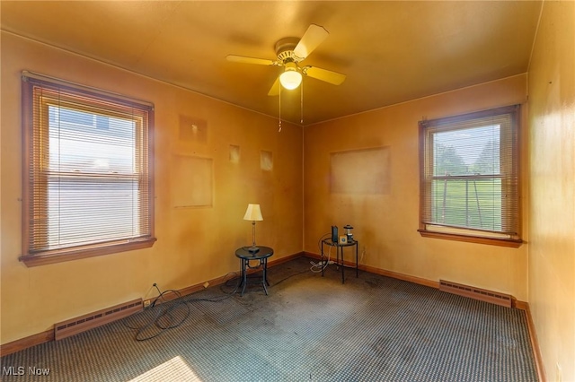 6567 Mount Everett Rd, Hubbard, OH 44425 - unfurnished room featuring carpet flooring, baseboard heating, healthy amount of natural light, and ceiling fan