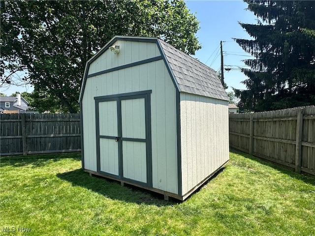 3005 Chaucer Dr NE, Canton, OH 44721 - view of shed with a fenced backyard