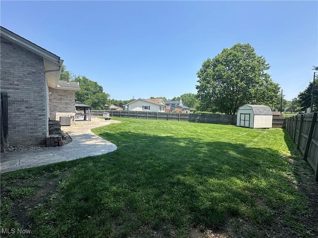 3005 Chaucer Dr NE, Canton, OH 44721 - fenced backyard featuring a storage shed and a patio area