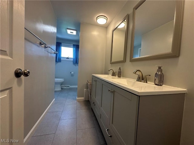 3005 Chaucer Dr NE, Canton, OH 44721 - bathroom featuring double vanity and tile patterned flooring