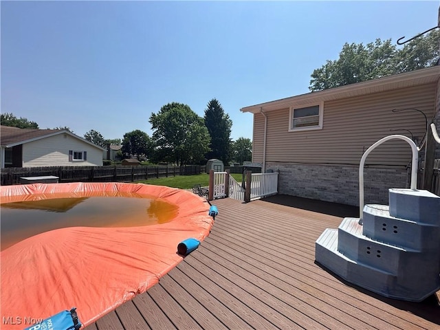 3005 Chaucer Dr NE, Canton, OH 44721 - wooden terrace with a fenced backyard