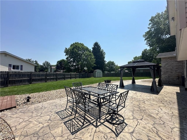 3005 Chaucer Dr NE, Canton, OH 44721 - fenced backyard featuring a patio area, a shed, outdoor dining space, and a gazebo
