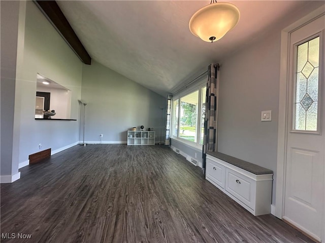3005 Chaucer Dr NE, Canton, OH 44721 - unfurnished living room featuring lofted ceiling and dark wood finished floors
