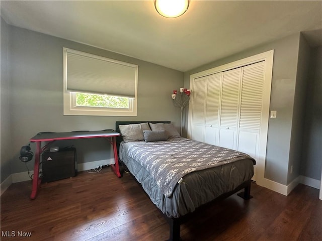3005 Chaucer Dr NE, Canton, OH 44721 - bedroom featuring wood finished floors and a closet