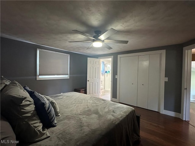 3005 Chaucer Dr NE, Canton, OH 44721 - bedroom featuring wood finished floors, a closet, ceiling fan, and connected bathroom