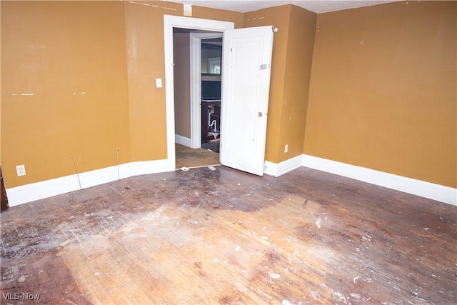 774 Storer Ave, Akron, OH 44320 - unfurnished room featuring hardwood / wood-style flooring