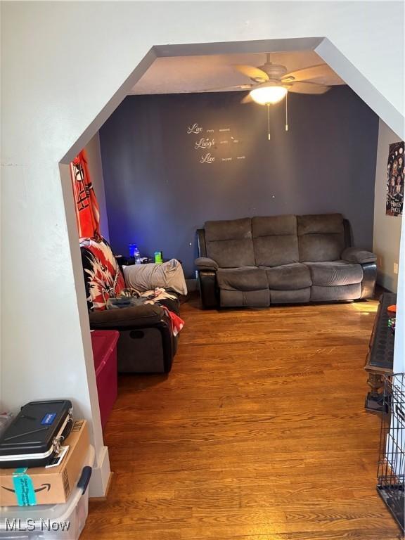 11 Front St, Rittman, OH 44270 - living area with wood finished floors and ceiling fan