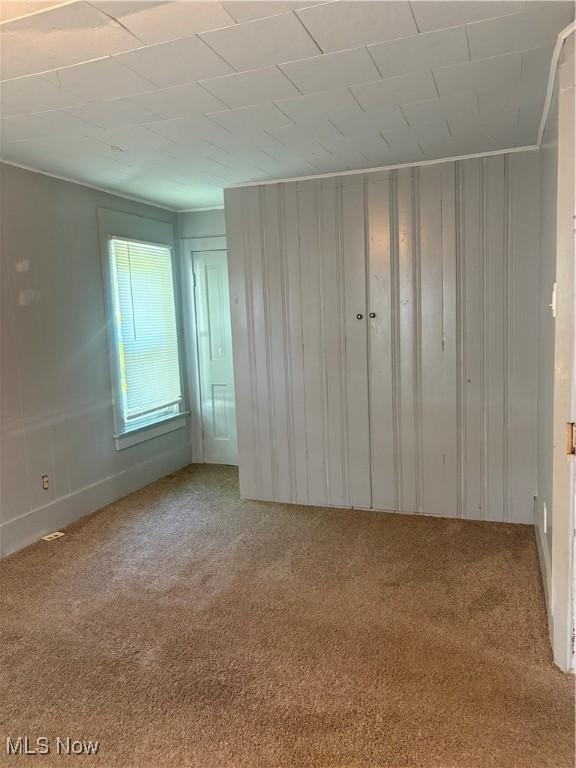 11 Front St, Rittman, OH 44270 - unfurnished bedroom featuring carpet floors