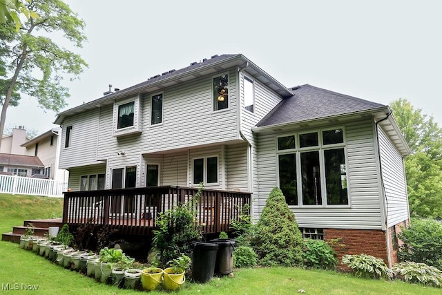 620 Ridgeline Dr, Cuyahoga Falls, OH 44223 - back of property featuring a deck and a lawn