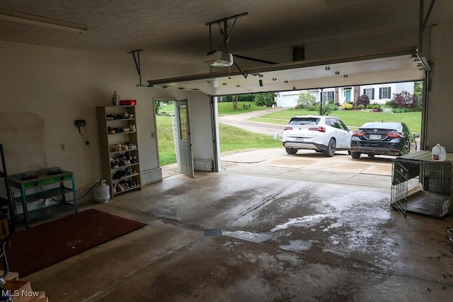 620 Ridgeline Dr, Cuyahoga Falls, OH 44223 - garage featuring a garage door opener
