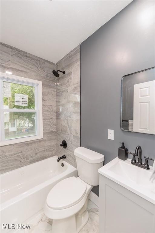 10310 Thrush Ave, Cleveland, OH 44111 - bathroom featuring vanity, marble look tiles, and bathing tub / shower combination