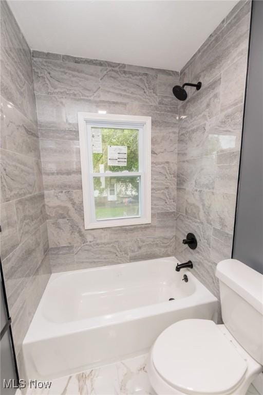 10310 Thrush Ave, Cleveland, OH 44111 - bathroom with shower / bathtub combination and marble finish flooring