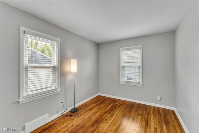 6207 Dartworth Dr, Parma, OH 44129 - spare room with baseboards and wood finished floors