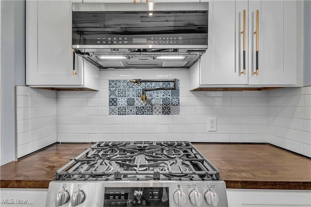 6207 Dartworth Dr, Parma, OH 44129 - kitchen featuring exhaust hood, stainless steel gas range, tasteful backsplash, and white cabinetry