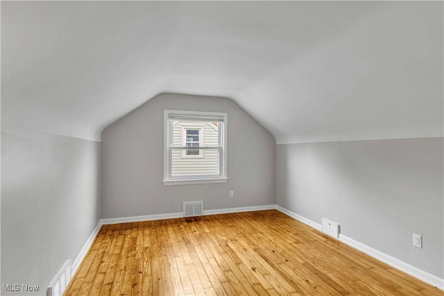 6207 Dartworth Dr, Parma, OH 44129 - bonus room with light wood finished floors and vaulted ceiling
