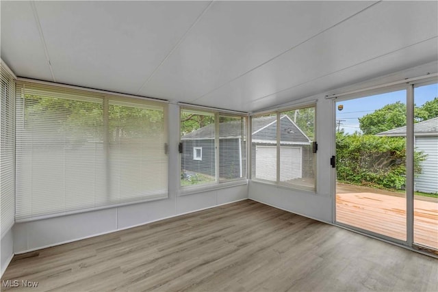 6207 Dartworth Dr, Parma, OH 44129 - unfurnished sunroom with wood finished floors and plenty of natural light