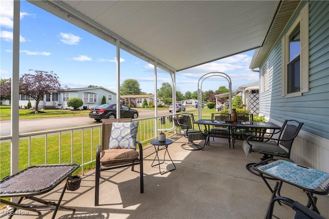 8 Symphony St, Olmsted Twp, OH 44138 - sunroom with a residential view and outdoor dining area