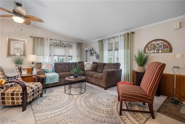 8 Symphony St, Olmsted Twp, OH 44138 - living area with ceiling fan, crown molding, vaulted ceiling, wooden walls, and wainscoting