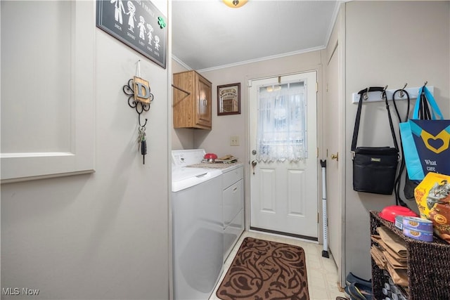 8 Symphony St, Olmsted Twp, OH 44138 - laundry area with cabinet space, washer and clothes dryer, and crown molding