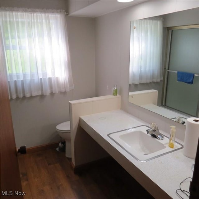 399 N Main St, Amsterdam, OH 43903 - bathroom with vanity and wood finished floors