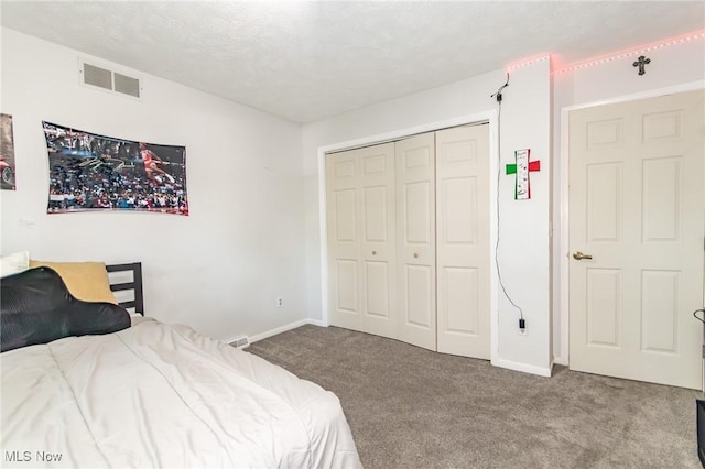 5710 Cardinal Dr, Mentor, OH 44060 - bedroom with carpet floors, a closet, and a textured ceiling