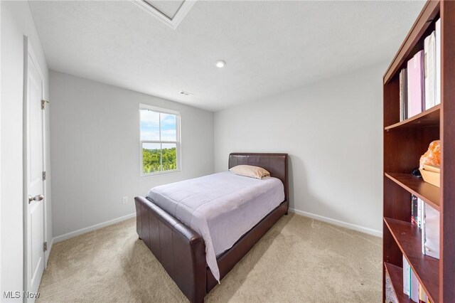 2457 Bishop Oval, Barberton, OH 44203 - bedroom with carpet, attic access, and recessed lighting