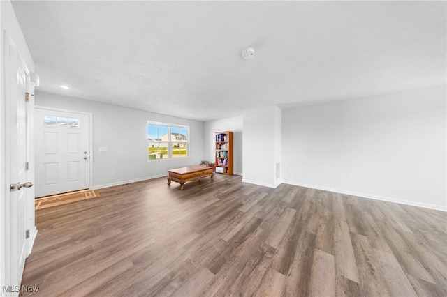 2457 Bishop Oval, Barberton, OH 44203 - living room featuring wood finished floors and baseboards