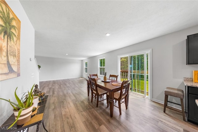 2457 Bishop Oval, Barberton, OH 44203 - dining space with wood finished floors and recessed lighting
