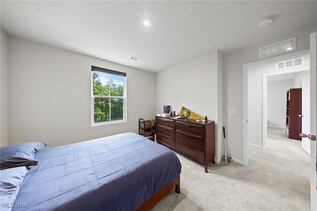 2457 Bishop Oval, Barberton, OH 44203 - bedroom with light carpet and baseboards