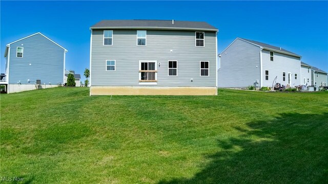 2457 Bishop Oval, Barberton, OH 44203 - rear view of house with a yard