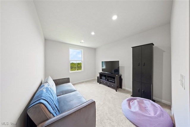 2457 Bishop Oval, Barberton, OH 44203 - living area featuring light carpet and recessed lighting