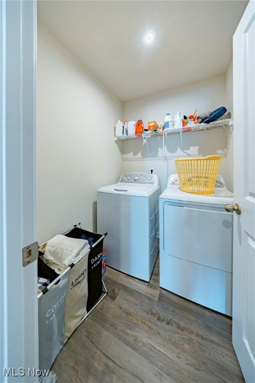 2457 Bishop Oval, Barberton, OH 44203 - laundry room with independent washer and dryer and wood finished floors