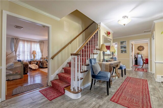 1201 Overlook Dr, Alliance, OH 44601 - stairway with wood finished floors and ornamental molding