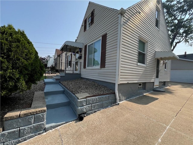 1749 Highview Ave, Akron, OH 44301 - view of property exterior featuring a garage and an outbuilding