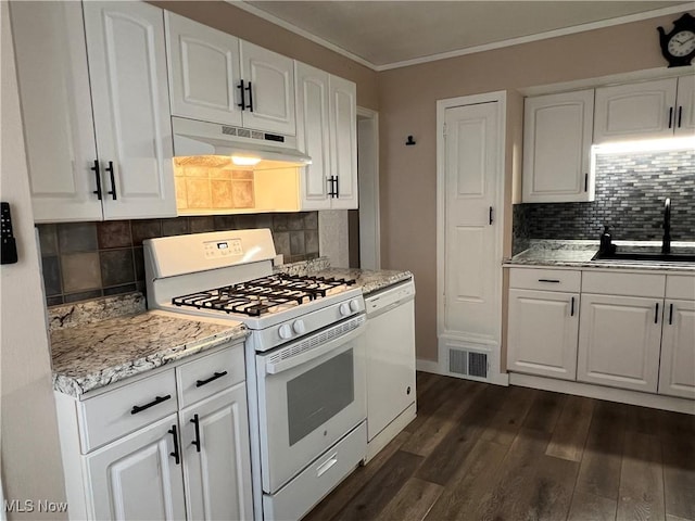 1749 Highview Ave, Akron, OH 44301 - kitchen featuring white appliances, under cabinet range hood, white cabinetry, decorative backsplash, and crown molding